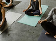 People meditating in a yoga class